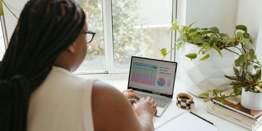 a woman using a laptop